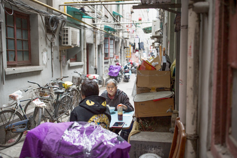 Ladies eating lunch in an alley Shanghai China