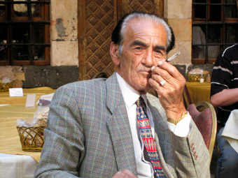 syrian man smoking in cafe