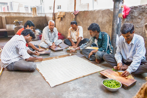 men making pastries on roof in hyderabad india